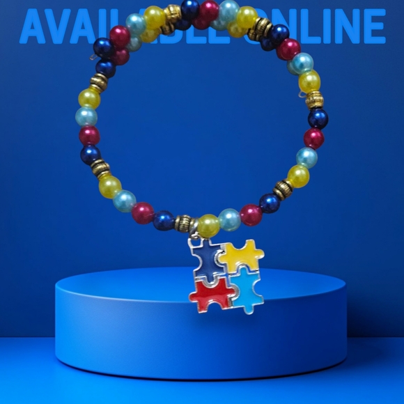 Jewelry - NWOT Autistic Puzzle Piece Bracelet